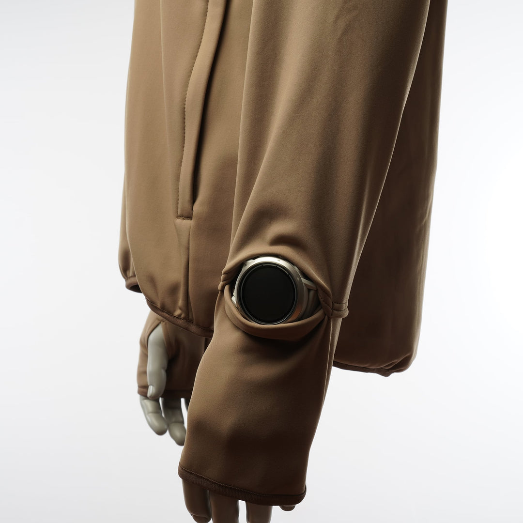 Tabisuke Tabizo T2 Jogger Jacket 2025 in brown, winter running jacket with Artica stretch fabric, thumbholes and watch opening