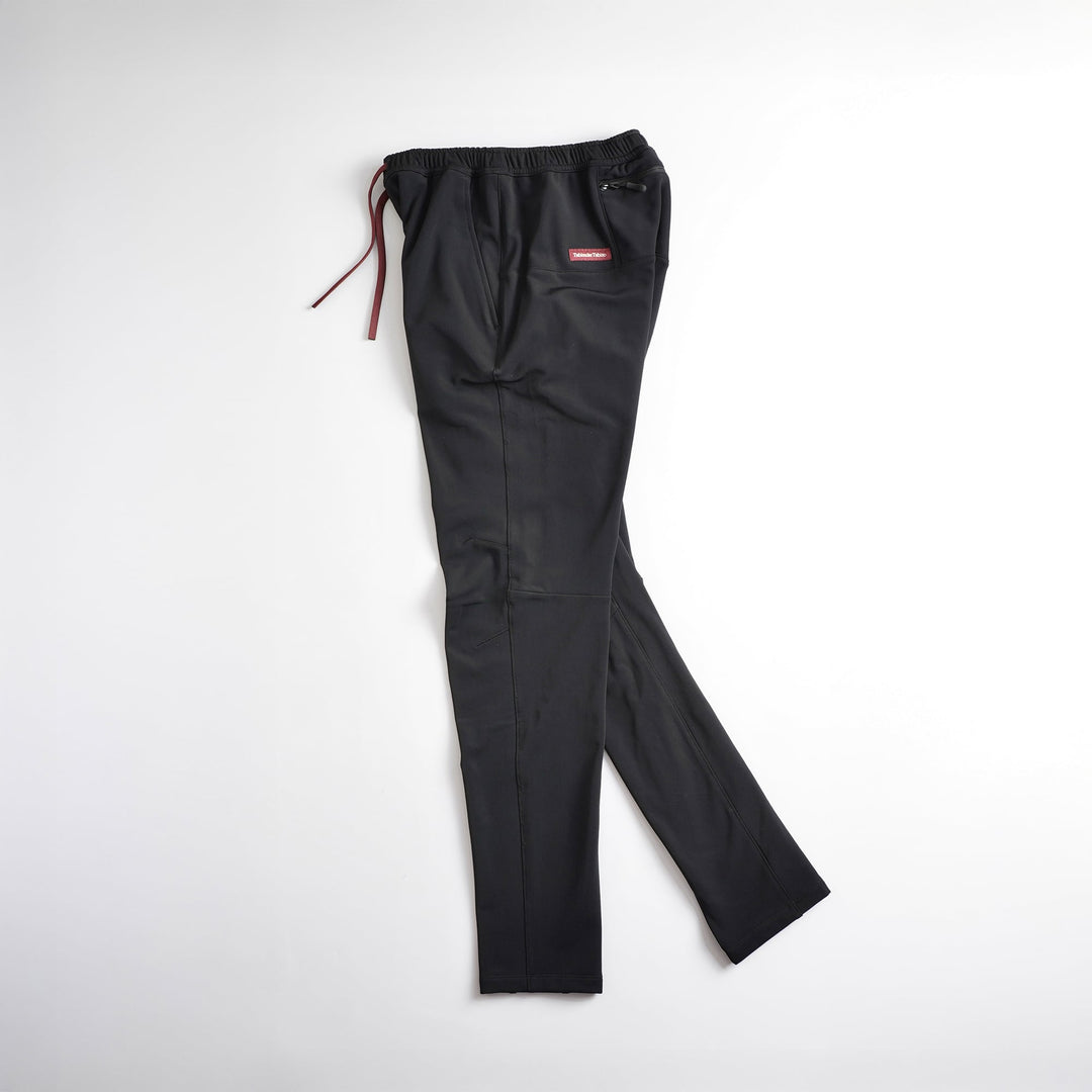 Tabisuke Tabizo T2 Jogger Pants 2025 in black, slim-fit winter running pants with zip pockets and elastic waistband