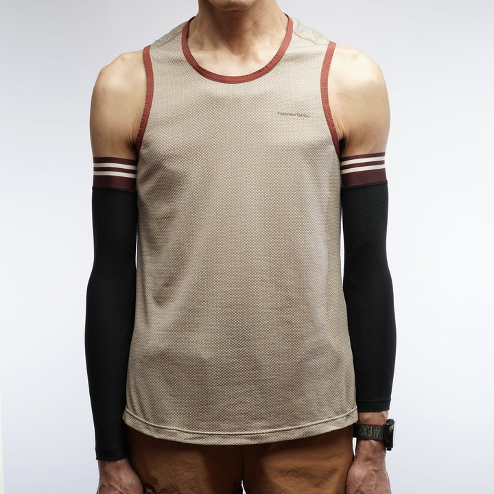 White racing arm sleeve with lightweight compression and asymmetrical design for running and racing.