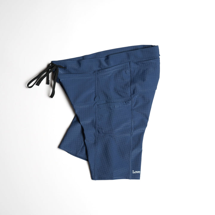 T2 Racing Tights short marathon tights in black with six-pocket race layout and lightweight compressive fabric