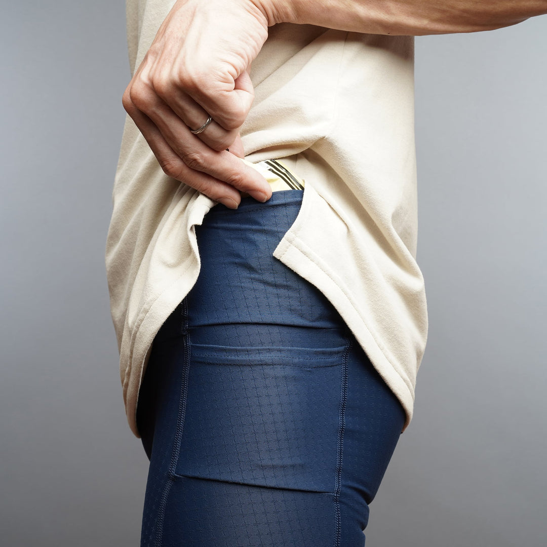 T2 Racing Tights short marathon tights in black with six-pocket race layout and lightweight compressive fabric