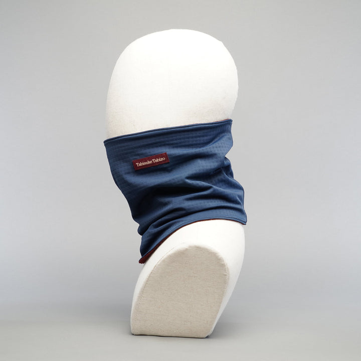 Tabisuke Tabizo T2 winter running neck gaiter in navy, dual-layer technical fabric with close-fitting design for cold-weather running