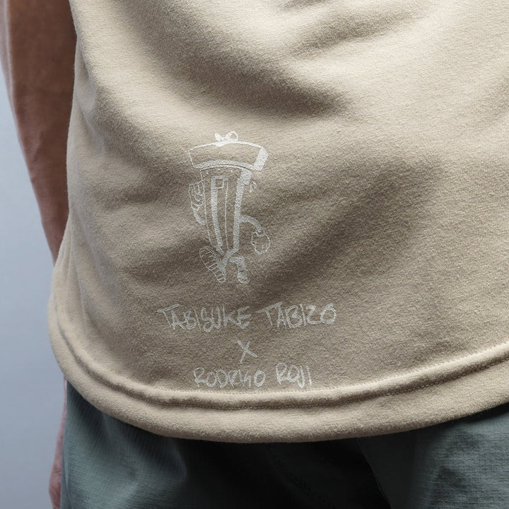 T2 Racing Singlet in beige made with Polartec® Delta™, lightweight marathon running tank with relaxed A-line fit