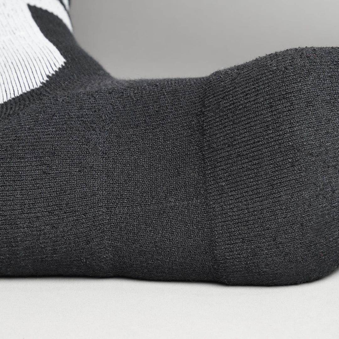Black crew-length T2 Ultra Socks by Tabisuke Tabizo, featuring foot-mapped knit structure, arch compression, and durable fabric for trail running and fastpacking.