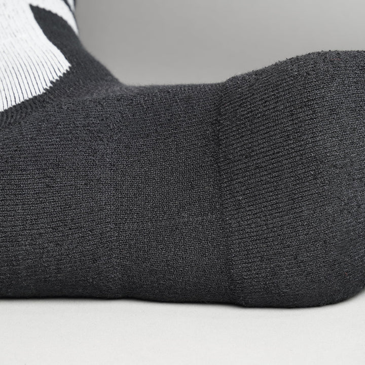 Black crew-length T2 Ultra Socks by Tabisuke Tabizo, featuring foot-mapped knit structure, arch compression, and durable fabric for trail running and fastpacking.