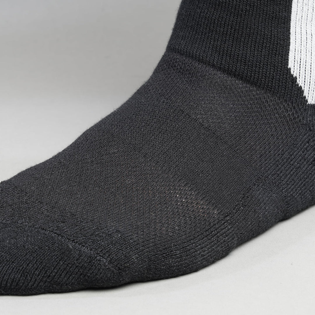 Black crew-length T2 Ultra Socks by Tabisuke Tabizo, featuring foot-mapped knit structure, arch compression, and durable fabric for trail running and fastpacking.