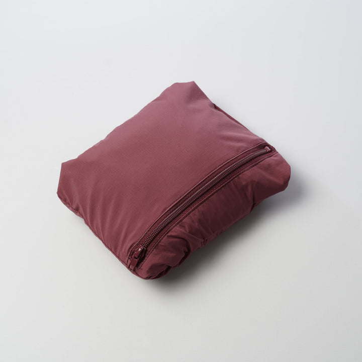 T2 Running Wind Shell Vest in bordeaux with windproof front and breathable mesh back