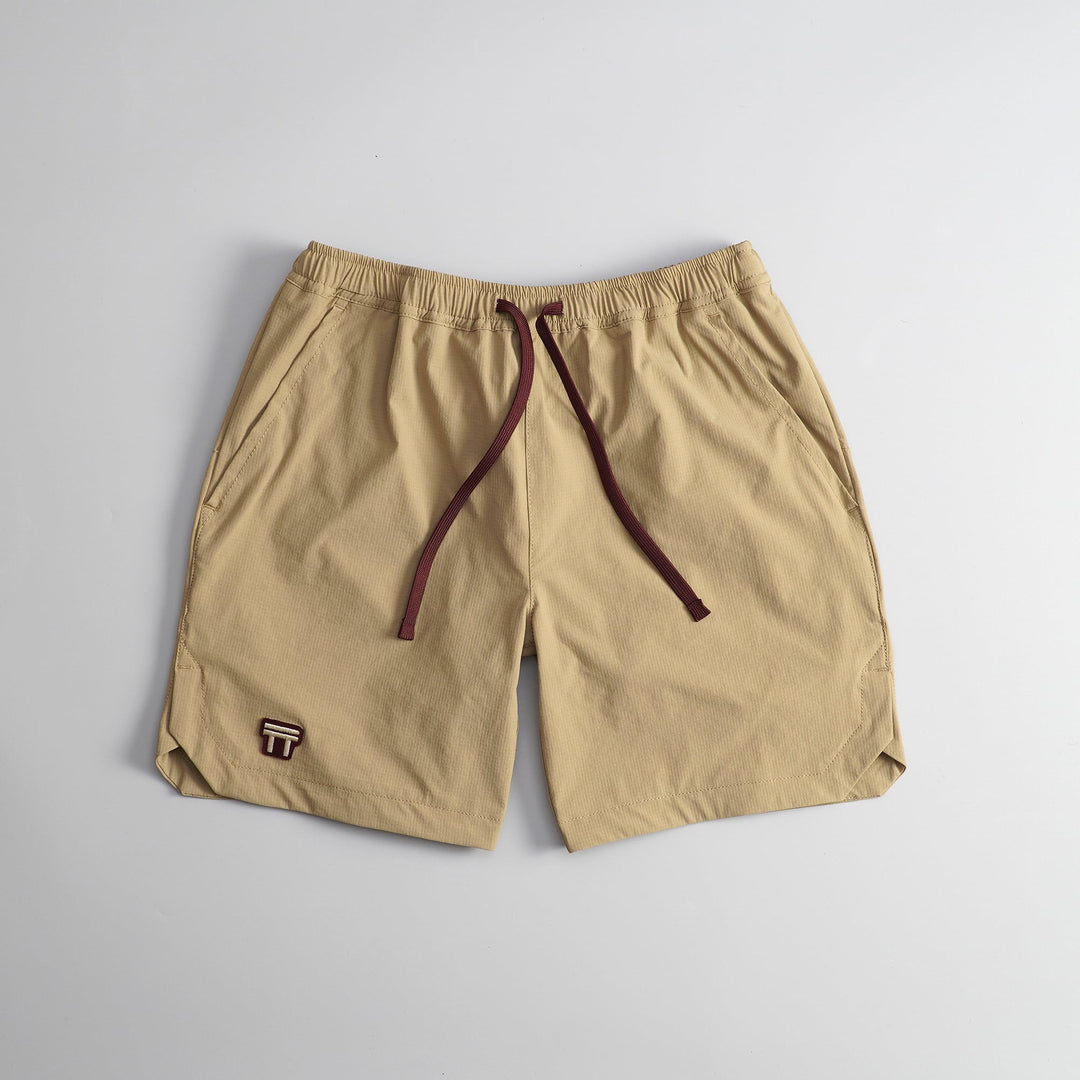 T2 Traverse Shorts fastpacking shorts in beige with reinforced gusseted crotch and lightweight stretch fabric