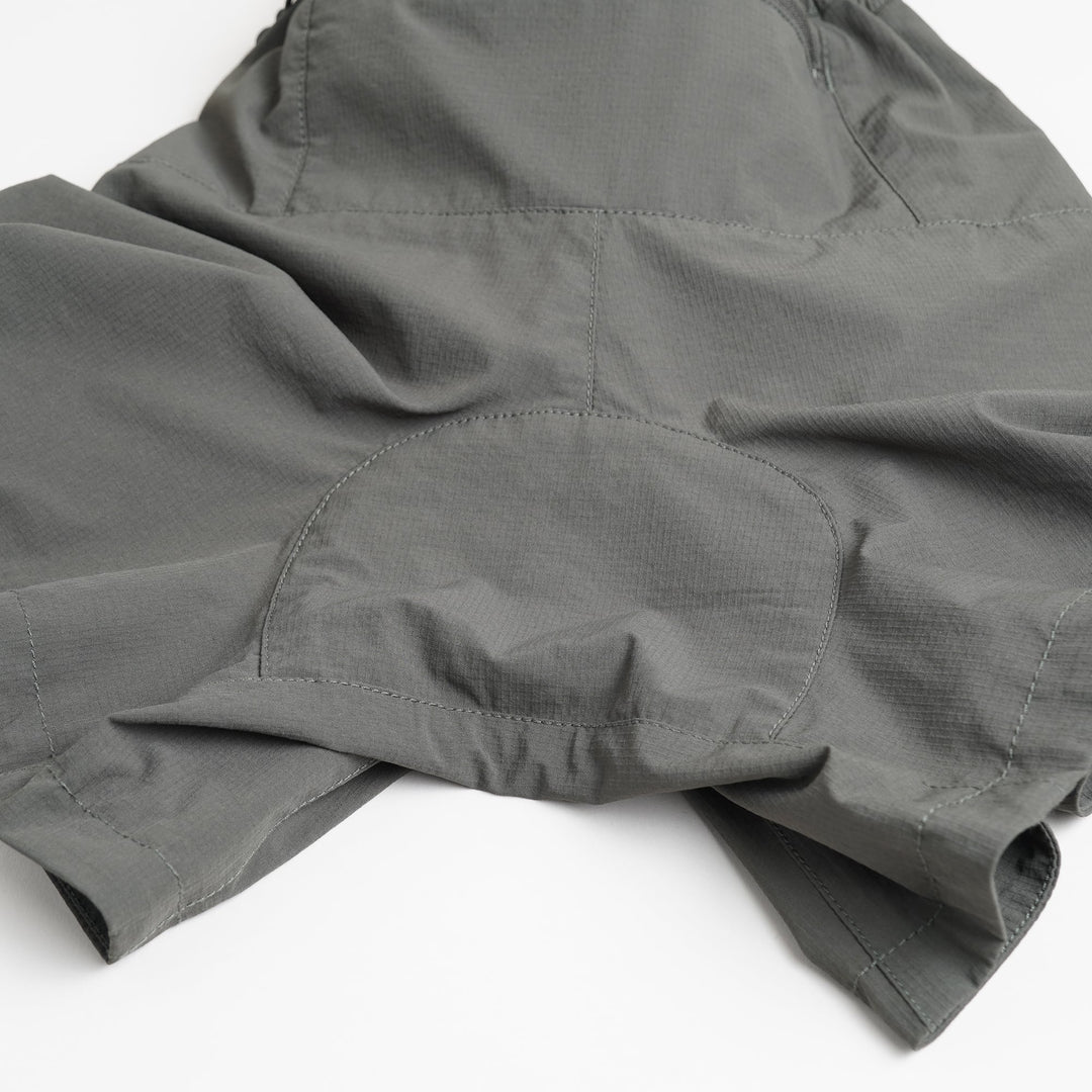 T2 Traverse Shorts trail running shorts in blue-gray with stretch nylon fabric and zippered pockets