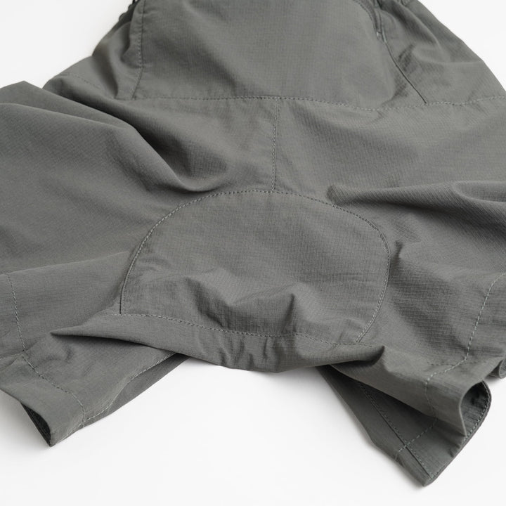 T2 Traverse Shorts trail running shorts in blue-gray with stretch nylon fabric and zippered pockets