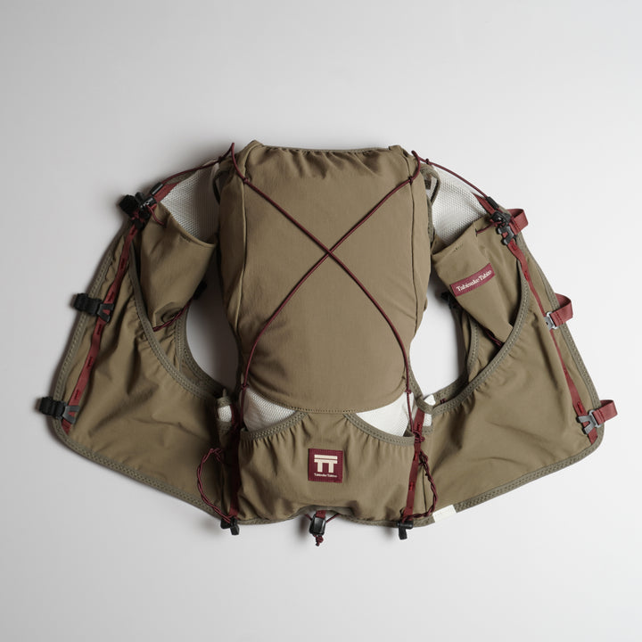 Khaki T2 Ultra 10 running vest with high-mounted storage, front flask pockets, and T2 High Mount Fit™ 2.0 system
