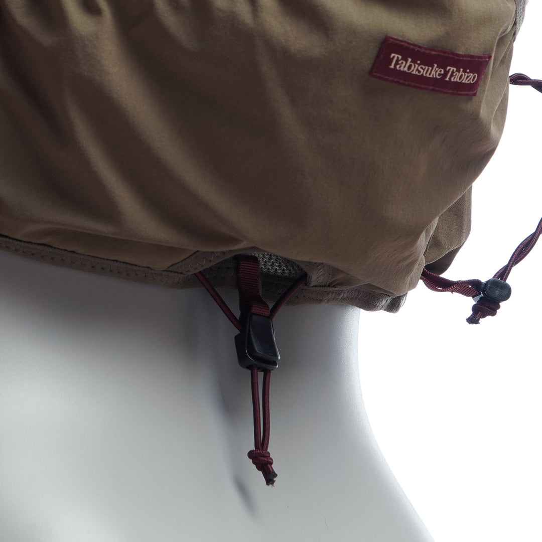 Khaki T2 Ultra 10 running vest with high-mounted storage, front flask pockets, and T2 High Mount Fit™ 2.0 system