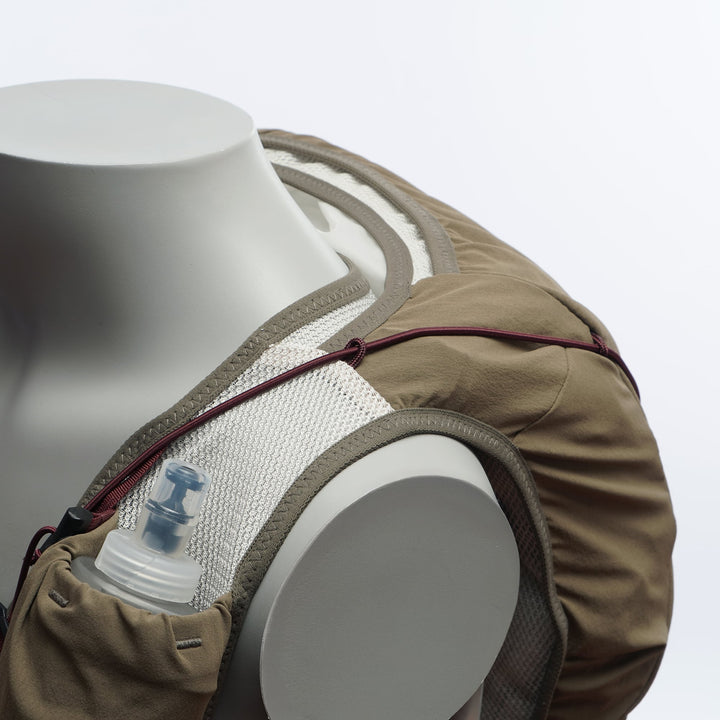 Khaki T2 Ultra 10 running vest with high-mounted storage, front flask pockets, and T2 High Mount Fit™ 2.0 system