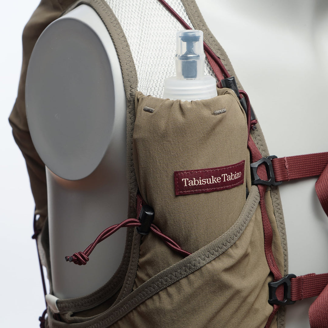 Khaki T2 Ultra 10 running vest with high-mounted storage, front flask pockets, and T2 High Mount Fit™ 2.0 system