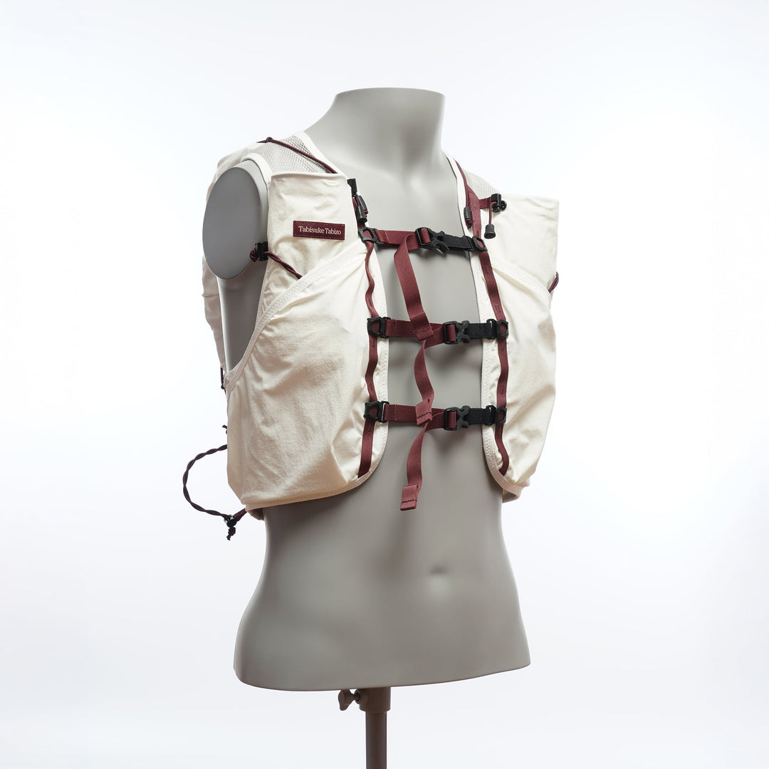 White T2 Ultra 10 running vest with high-mounted storage, front flask pockets, and T2 High Mount Fit™ 2.0 system