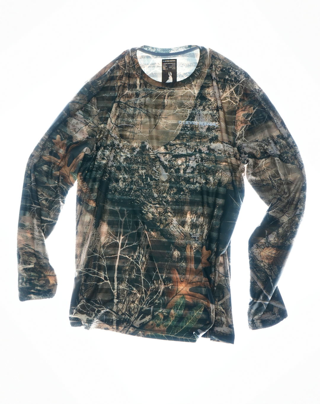 Camo long sleeve running top by Lievre Running featuring an all-over woodland camouflage pattern in earthy green and brown tones, lightweight fabric designed for training and everyday running.