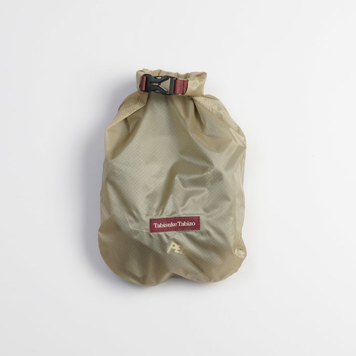 Tabisuke Tabizo T2 Waterproof Pouch #1 in beige, compact B5 roll-top dry bag for small outdoor essentials