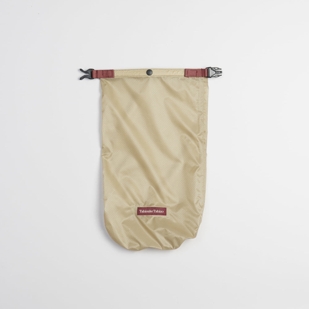 Tabisuke Tabizo T2 Waterproof Pouch #1 in beige, compact B5 roll-top dry bag for small outdoor essentials