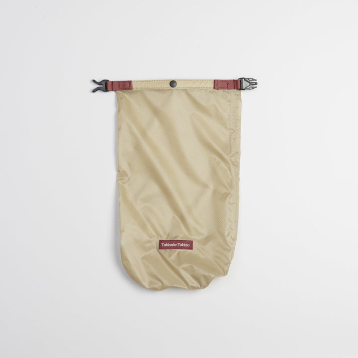 Tabisuke Tabizo T2 Waterproof Pouch #1 in beige, compact B5 roll-top dry bag for small outdoor essentials