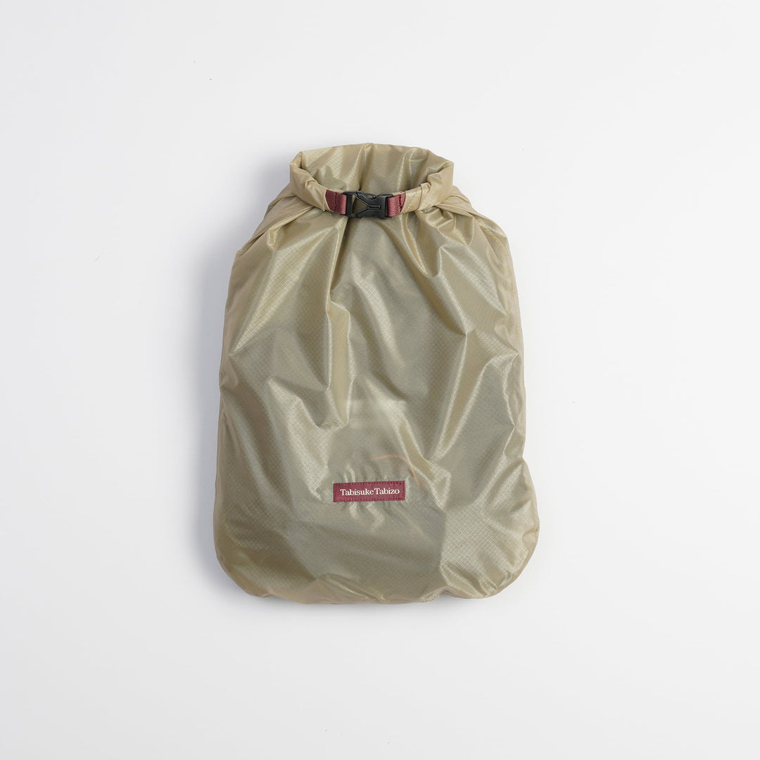 Tabisuke Tabizo T2 Waterproof Pouch #3 in beige, lightweight B4 dry pouch made from CORDURA® ripstop nylon for storing rainwear and accessories
