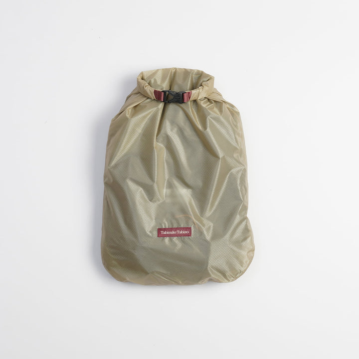 Tabisuke Tabizo T2 Waterproof Pouch #3 in beige, lightweight B4 dry pouch made from CORDURA® ripstop nylon for storing rainwear and accessories