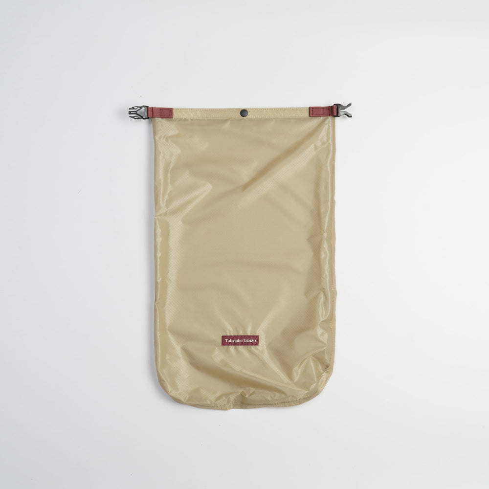 Tabisuke Tabizo T2 Waterproof Pouch #3 in beige, lightweight B4 dry pouch made from CORDURA® ripstop nylon for storing rainwear and accessories