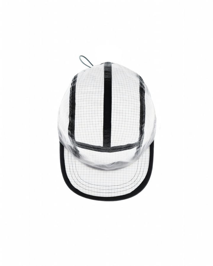 Lievre Running Art of Running White Cap showcasing its minimal design and ultra-lightweight fabric, ideal for runners.